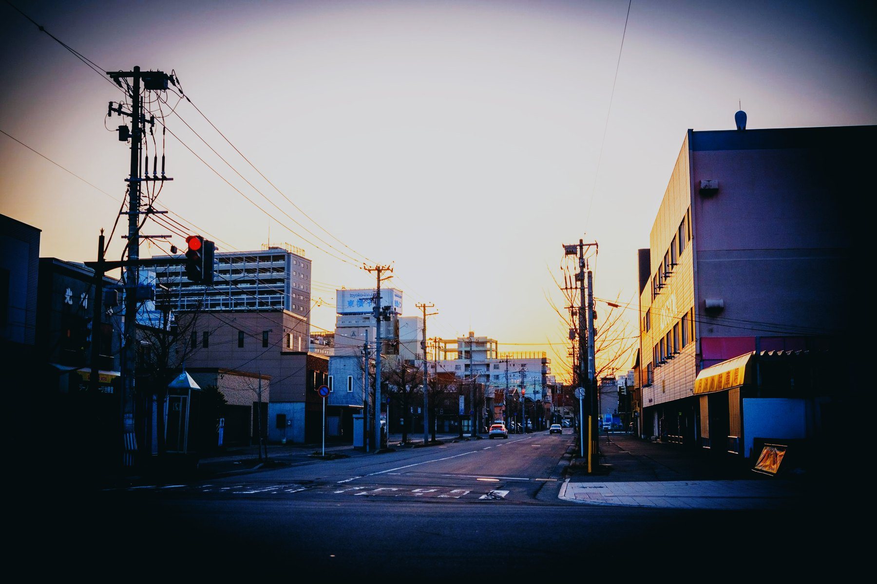 An empty street at sunset, rendered with the Gold 200 recipe